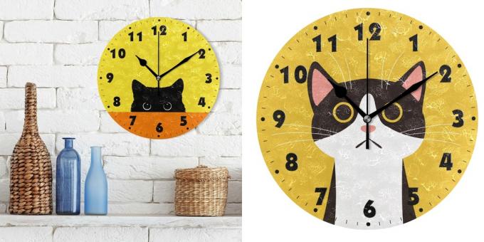 ساعة حائط مع قطط 