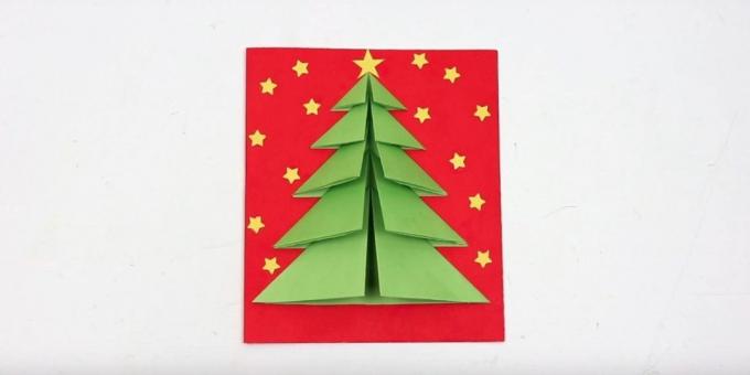 بطاقة عيد الميلاد مع شجرة عيد الميلاد على غلاف حجم